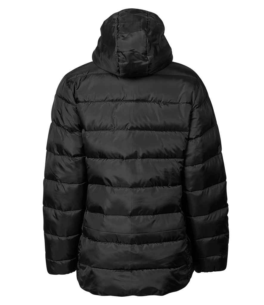 Woman applying mascara to her eyelashes with a brush.