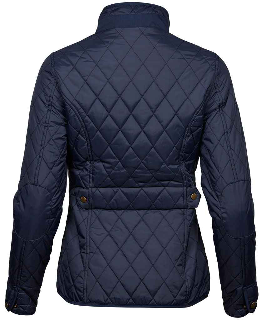 Woman applying mascara to her eyelashes with a brush.