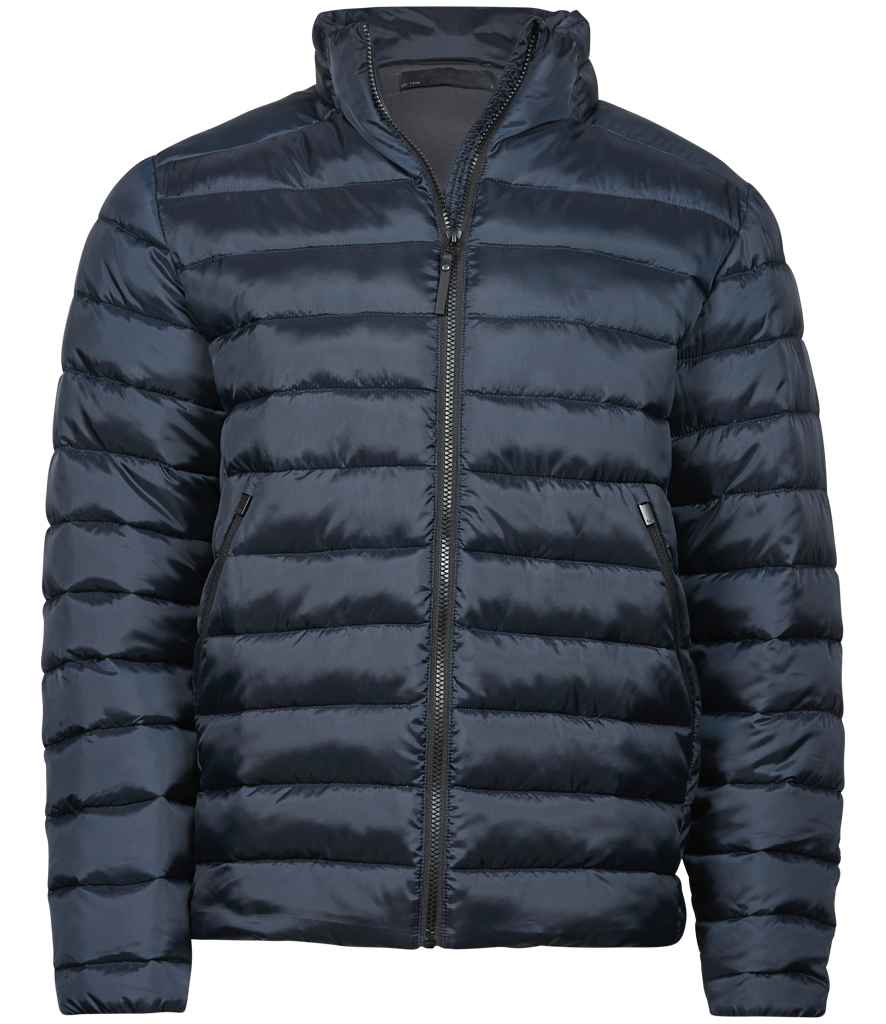 Woman applying mascara to her eyelashes with a brush.