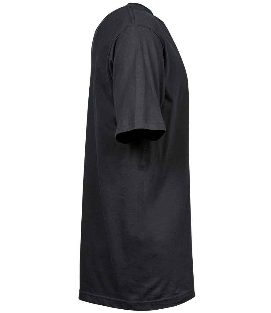 Woman applying mascara to her eyelashes with a brush.