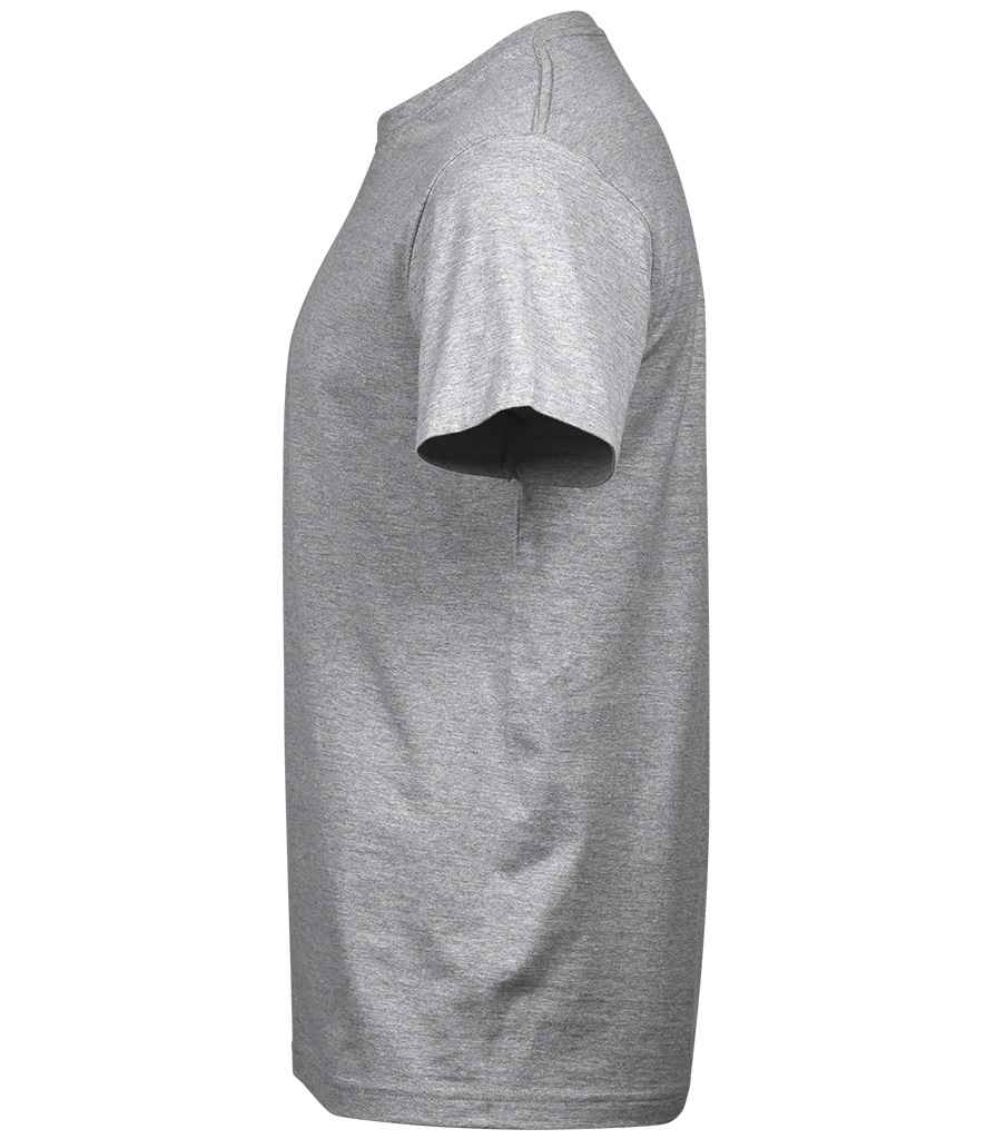 Woman applying mascara to her eyelashes with a brush.