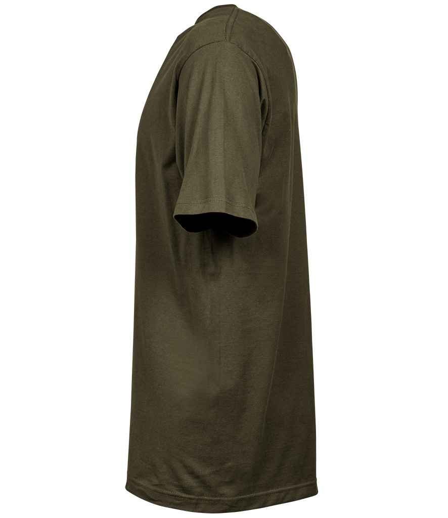 Woman applying mascara to her eyelashes with a brush.