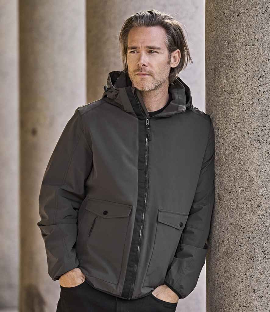 Tee Jays Urban Adventure Shell Jacket Dark Olive detachable hood contrast black zip chin guard dual-entry patch pockets